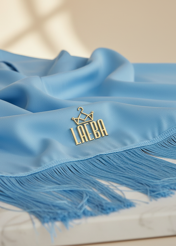 Ultra-realistic close-up of Tassel Edge Abaya with brushed gold Laeba pin